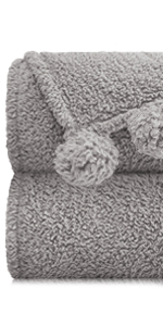 sherpa throw blanket with pom poms