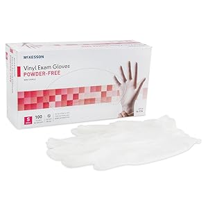 McKesson Non-Sterile Clear Vinyl Exam Gloves alongside packaging