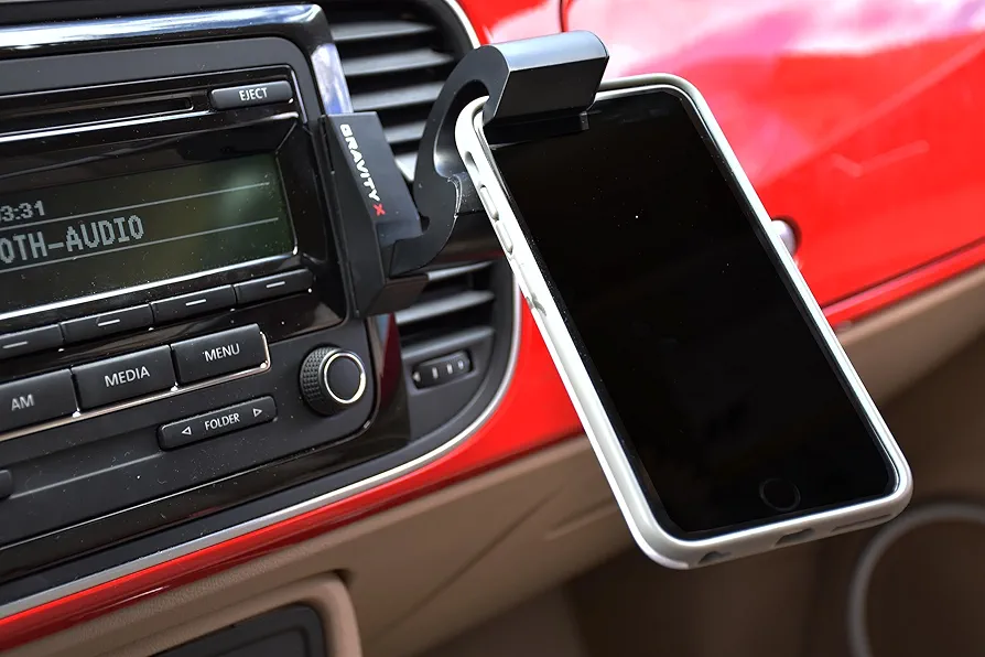 Car Phone Mount award winning patented design uses only Gravity and leverage, mounts in seconds with one hand. Compatible with all Smartphones and Tablets. Simple peal and stick mounting!