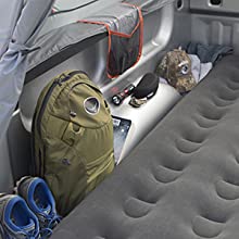 between wheel well design, truck bed air mattress storage